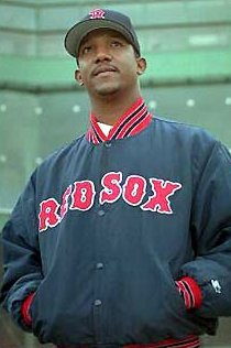 The photo of Pedro in
jacket with hands in pockets, with Fenway risers behind him, that 
I know you've seen before.